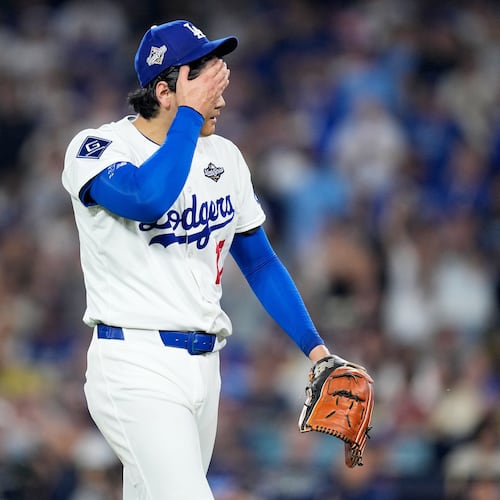 Los Angeles Dodgers pitcher Shohei Ohtani walks to the dugout after striking out Toronto Blue Jays' Alejandro Kirk during the sixth inning in Game 4 of baseball's World Series, Tuesday, Oct. 28, 2025, in Los Angeles. (AP Photo/Brynn Anderson)