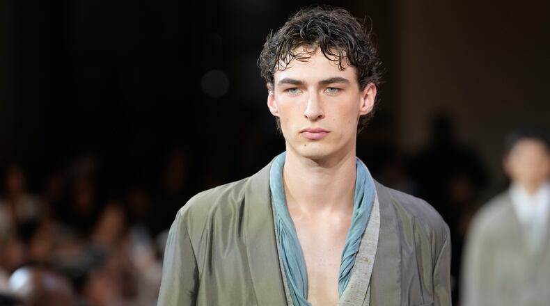 A model wears a creation as part of the Giorgio Armani Spring/Summer 2027 men's collection presented in Milan, Italy, Monday, June 22, 2026. (AP Photo/Luca Bruno)