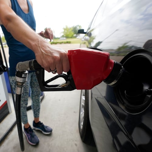 FILE - A customer readies to pump gas at this Ridgeland, Miss., Costco, Tuesday, May 24, 2022. s. (AP Photo/Rogelio V. Solis, File)