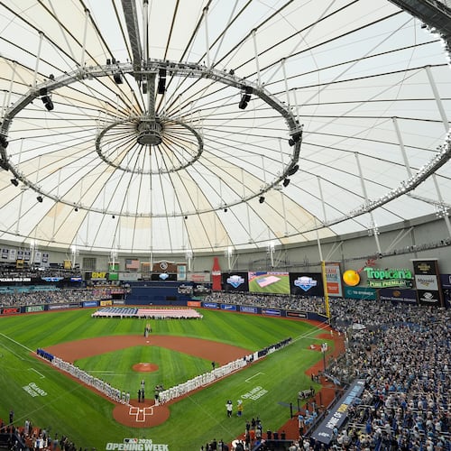 FILE - Players from the Chicago Cubs and Tampa Bay Rays are introduced before a baseball game Monday, April 6, 2026, in St. Petersburg, Fla. (AP Photo/Chris O'Meara, File)