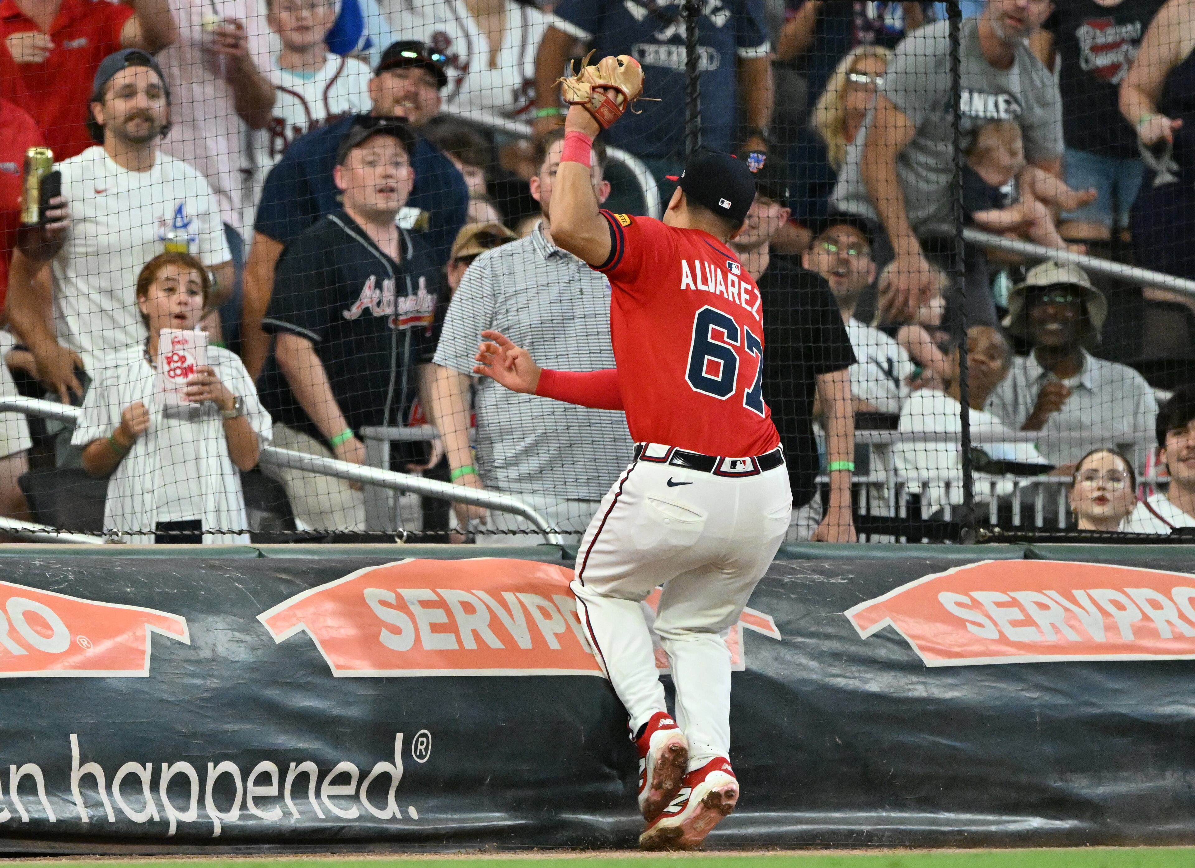 Atlanta Braves shortstop Nacho Alvarez Jr. (67) catches a fly-ball by New York Yankees catcher Austin Wells during the ninth inning of a baseball game at Truist Park, Friday, July 18, 2025, in Atlanta. Atlanta Braves won 7-3 over New York Yankees. (Hyosub Shin / AJC)
