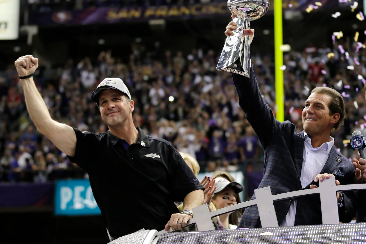 John Harbaugh (left) — pictured celebrating the Ravens' 2013 Super Bowl victory with team owner Stephen J. Bisciotti — took the Giants' head coaching job in large part because he reports directly to team owner John Mara as opposed to having a general manager or other executive to report to. (Matt Slocum/AP 2013)
