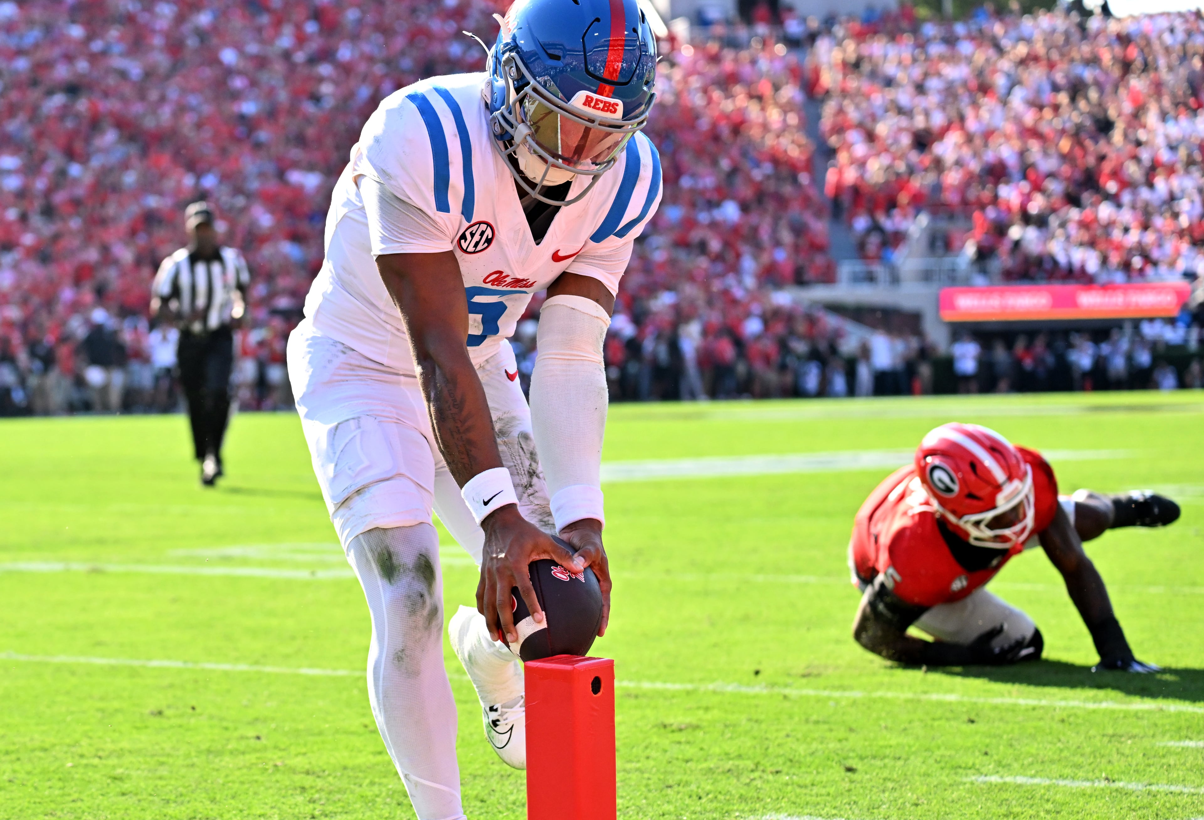 Mississippi quarterback Trinidad Chambliss (6) scores a touchdown during the first half in an NCAA football game at Sanford Stadium, Saturday, October 18, 2025, in Athens. (Hyosub Shin / AJC)