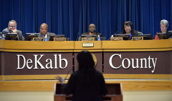 August 26, 2014 Decatur - DeKalb County commissioners (from left) Jeff Rader, Stan Watson, Larry Johnson, Sharon Barnes Sutton and Kathie Gannon listen during a public comment session at a meeting at Dekalb County Government Administration Building in Decatur on Tuesday, August 26, 2014. A day after resigning from office, DeKalb County Commissioner Elaine Boyer announced in court Tuesday she pleaded guilty to federal charges accusing her of two schemes to pocket tens of thousands of dollars from taxpayers. HYOSUB SHIN / HSHIN@AJC.COM