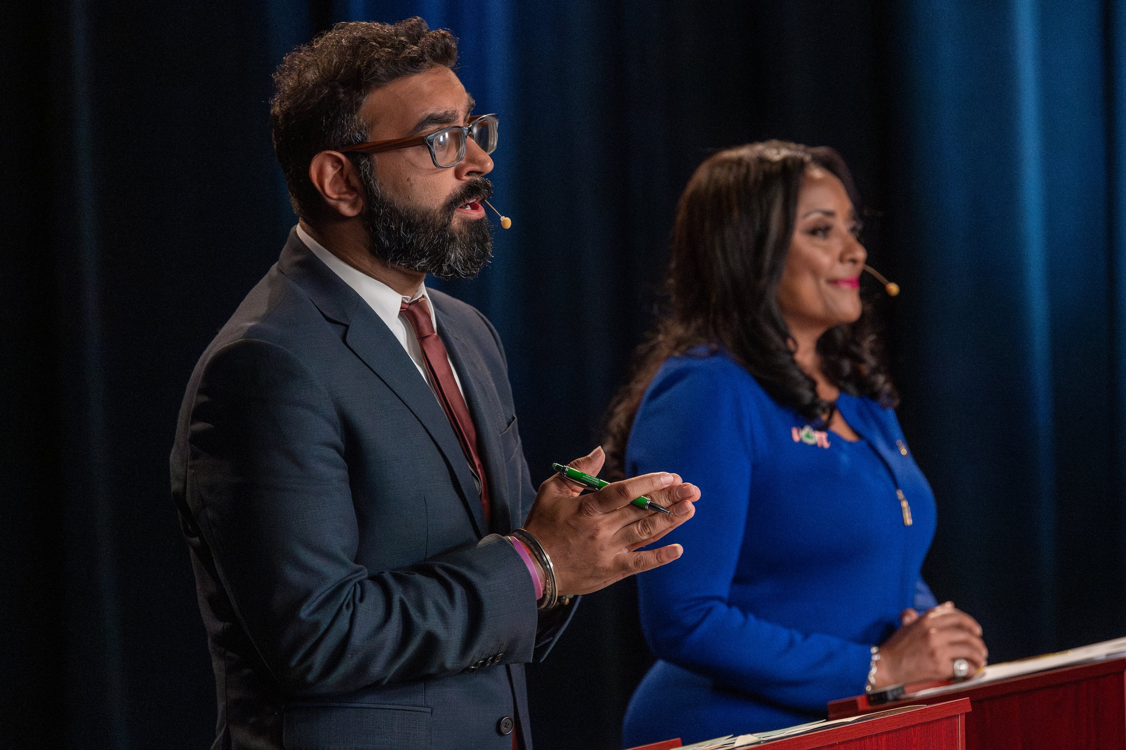 Candidates for Atlanta City Council president, Rohit Malhotra (left) and Council member Marci Collier Overstreet, face off during the Atlanta Press Club debate Oct. 10, 2025. (Courtesy of John Glenn)