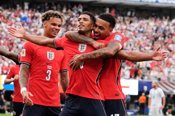England's Jude Bellingham (10) celebrates with teammates after scoring their first goal during the World Cup Group L soccer match between Panama and England in East Rutherford, N.J., near New York, Saturday, June 27, 2026. (Steve Luciano/AP)