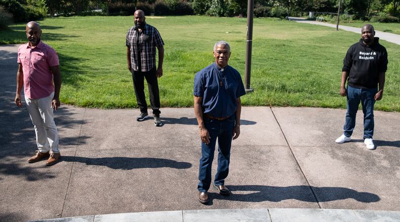 Craig Washington (from left), Anthony Antoine, the Rev. Duncan Teague and Charles Stephens were all members of the Second Sunday group that met from the early '90s to the early 2000s near the Historic Fourth Ward Park, where a historical marker will be erected. Ben Gray/For the AJC