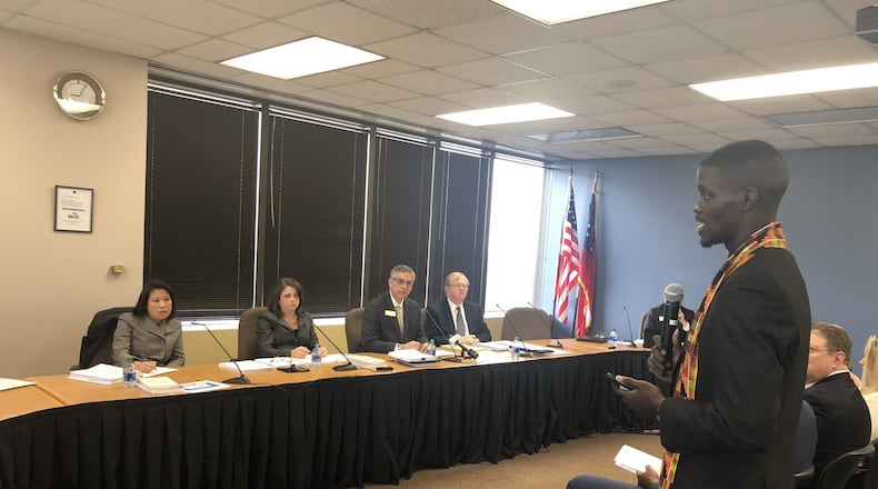 The State Election Board hears public comments from James Woodall, president of the Georgia NAACP, during a meeting Wednesday. Woodall told the board he’s concerned about voting security. From left: State Election Board members Anh Le, Rebecca Sullivan, Secretary of State Brad Raffensperger and David Worley. MARK NIESSE / MARK.NIESSE@AJC.COM
