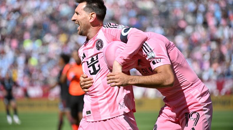 Inter Miami CF forwards Lionel Messi and Germán Berterame celebrate after a goal by Berterame in the first half of an MLS soccer game against the Colorado Rapids Saturday, April 18, 2026, in Denver. (AP Photo/Geneva Heffernan)