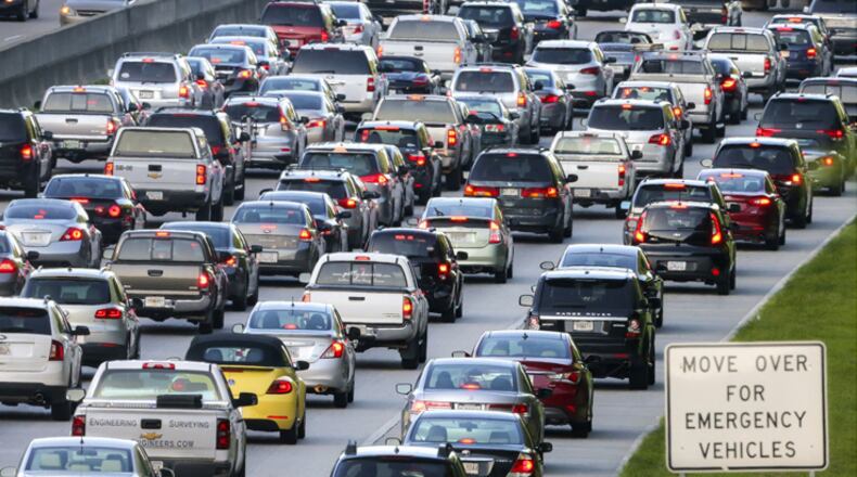 Heavy traffic clogs Atlanta roads. North Fulton County cities are asking residents what should be done about it. AJC FILE