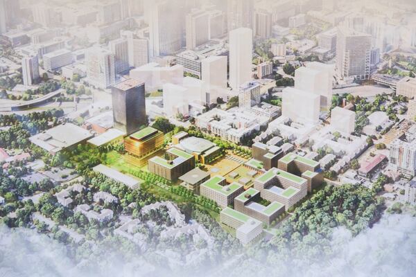 An aerial rendering of the redevelopment is displayed during the groundbreaking ceremony. (Abbey Cutrer/AJC)