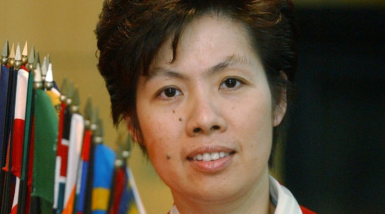 020510 ATLANTA, GA: Emily Fu  is chairwoman of the International Real Estate Council of Georgia. The council was created two years ago to teach real estate agents about the various ethnic markets. She's shown here at her office at RE/MAX Greater Atlanta in Atlanta Friday afternoon 5/10/2002. (BITA HONARVAR/STAFF)