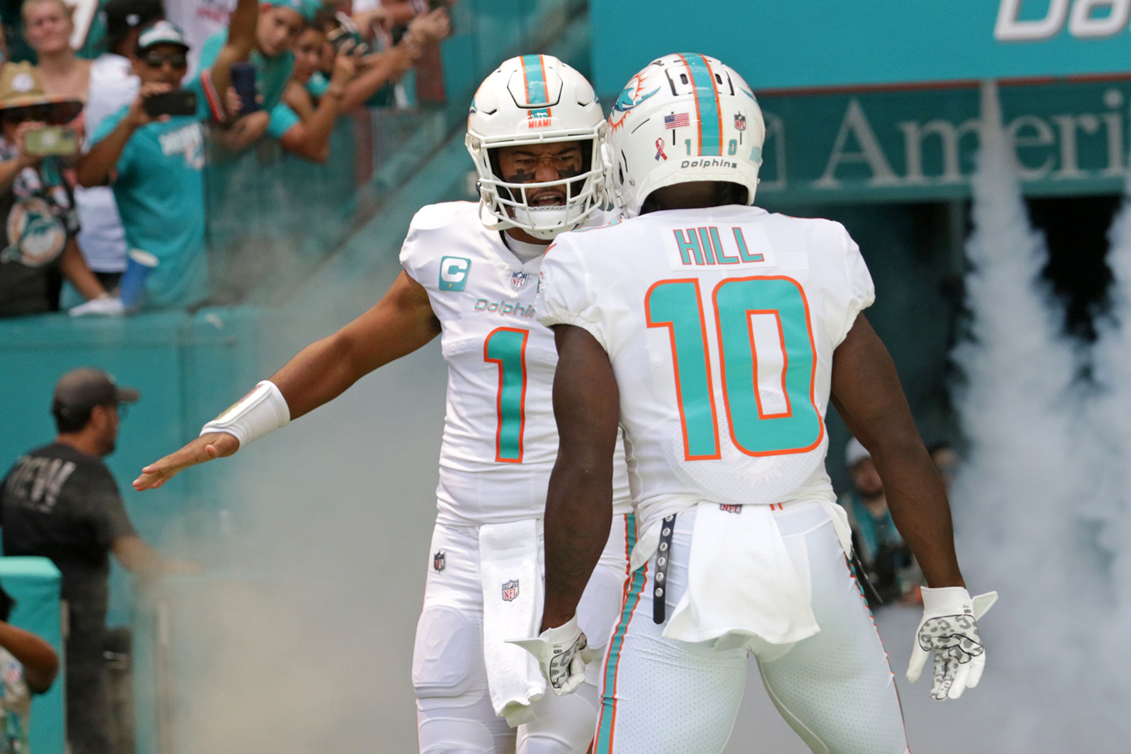 Miami Dolphins quarterback Tua Tagovailoa and wide receiver Tyreek Hill, in happier times.
