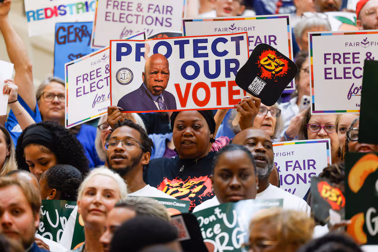 Activists opposed to redistricting gather at a press conference before the state legislature convenes for a special session in Atlanta on June 17, 2026. Georgia Republican leaders later announced that they wouldn’t redraw the state’s political maps during the session. (Arvin Temkar/AJC)