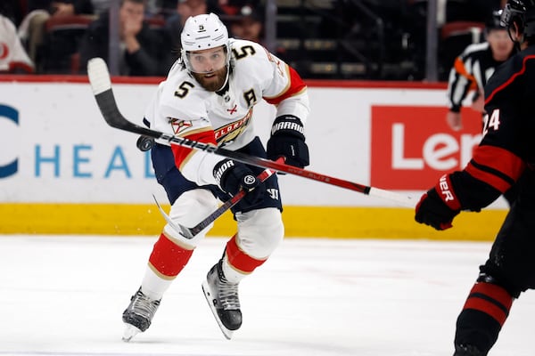 FILE - Florida Panthers' Aaron Ekblad (5) clears the puck against the Carolina Hurricanes during the first period of Game 1 of the NHL hockey Stanley Cup Eastern Conference finals in Raleigh, N.C., Tuesday, May 20, 2025. (AP Photo/Karl DeBlaker, file)