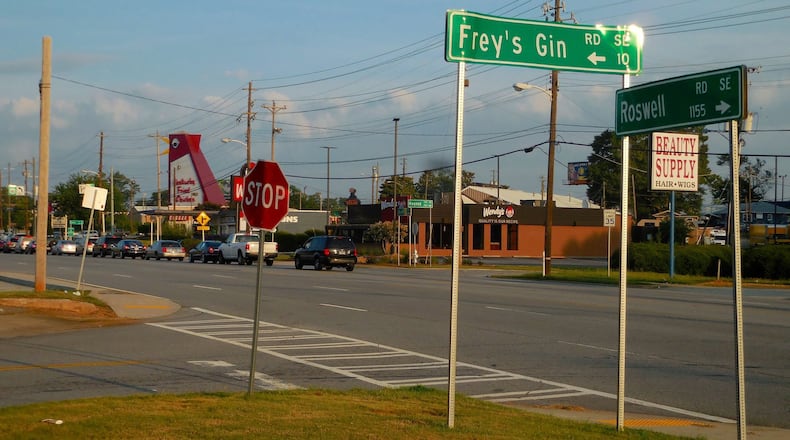 The intersection of Frey’s Gin Road meets Roswell Road in Cobb County has seen some history, some of it dark. Photo: Jennifer Brett/jbrett@ajc.com