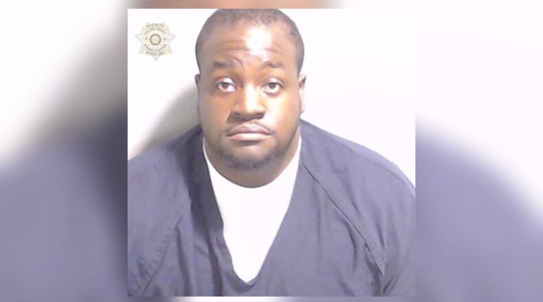 Monique Clark, 31, was fired from a job as a correctional officer with the Fulton County Sheriff's Office after being arrested on charges of assaulting a detainee during a custody exchange, Sheriff Pat Labat said.