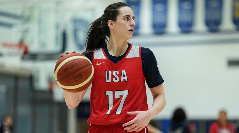 Caitlin Clark (17) brings the ball upcourt during a training camp for the U.S women's national basketball team, Friday, Dec. 12, 2025, in Durham, N.C. (AP Photo/Matt Kelley)