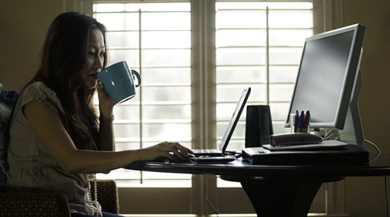 Denise Kenson-Liu works from home one day a week for her job with the IT department of Gwinnett County.