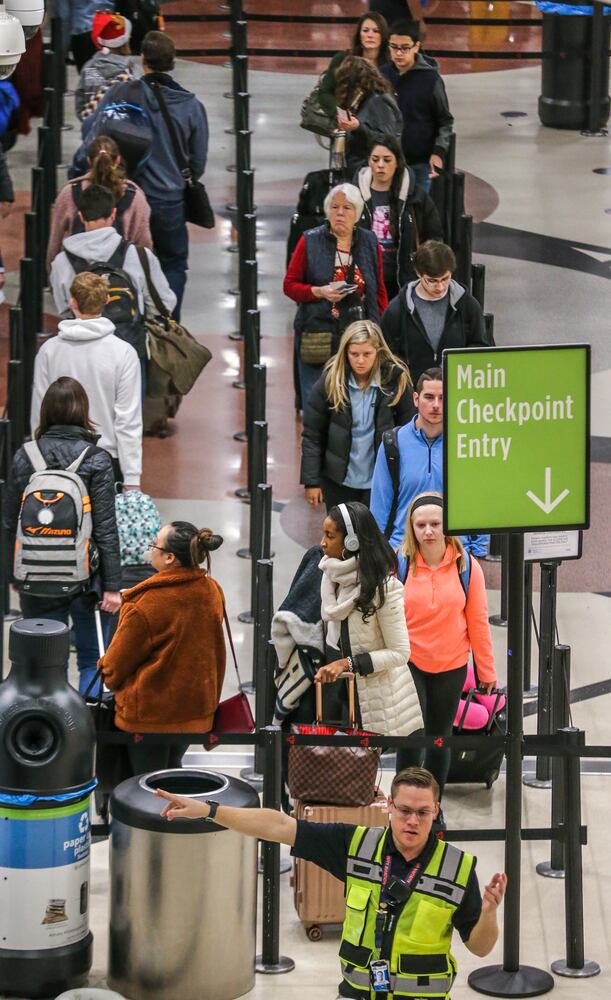 Holiday travelers navigate Atlanta's Hartsfield-Jackson
