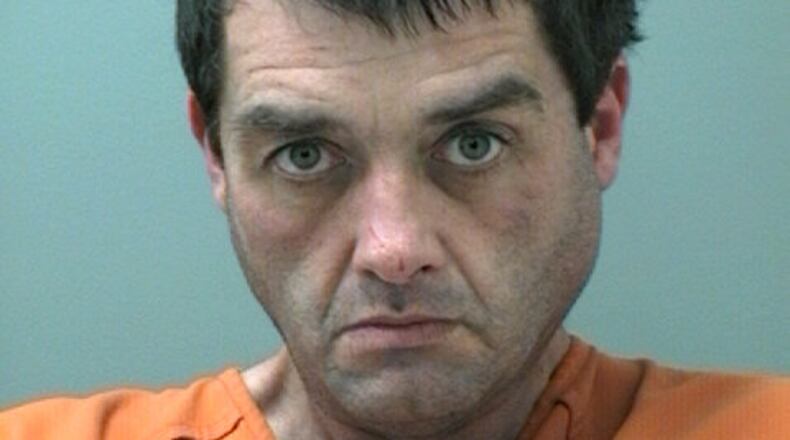 Michael Hulsey, 44, of Canton, was charged with trafficking methamphetamine, possession of a firearm by a convicted felon, possession of heroin, two counts of felony obstruction of an officer, simple battery on a law enforcement officer, battery and two counts of interference with government property, according to police. (Photo: Cherokee County Sheriff’s Office)