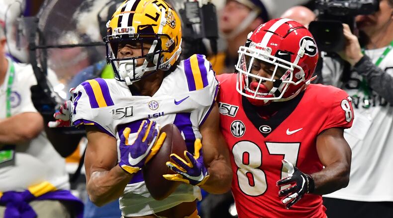 LSU's Derek Stingley Jr. intercepts a pass intended for Georgia's Tyler Simmons. Stingley is expected to be selected in the first round of the upcoming NFL draft. (Hyosub Shin / hyosub.shin@ajc.com)