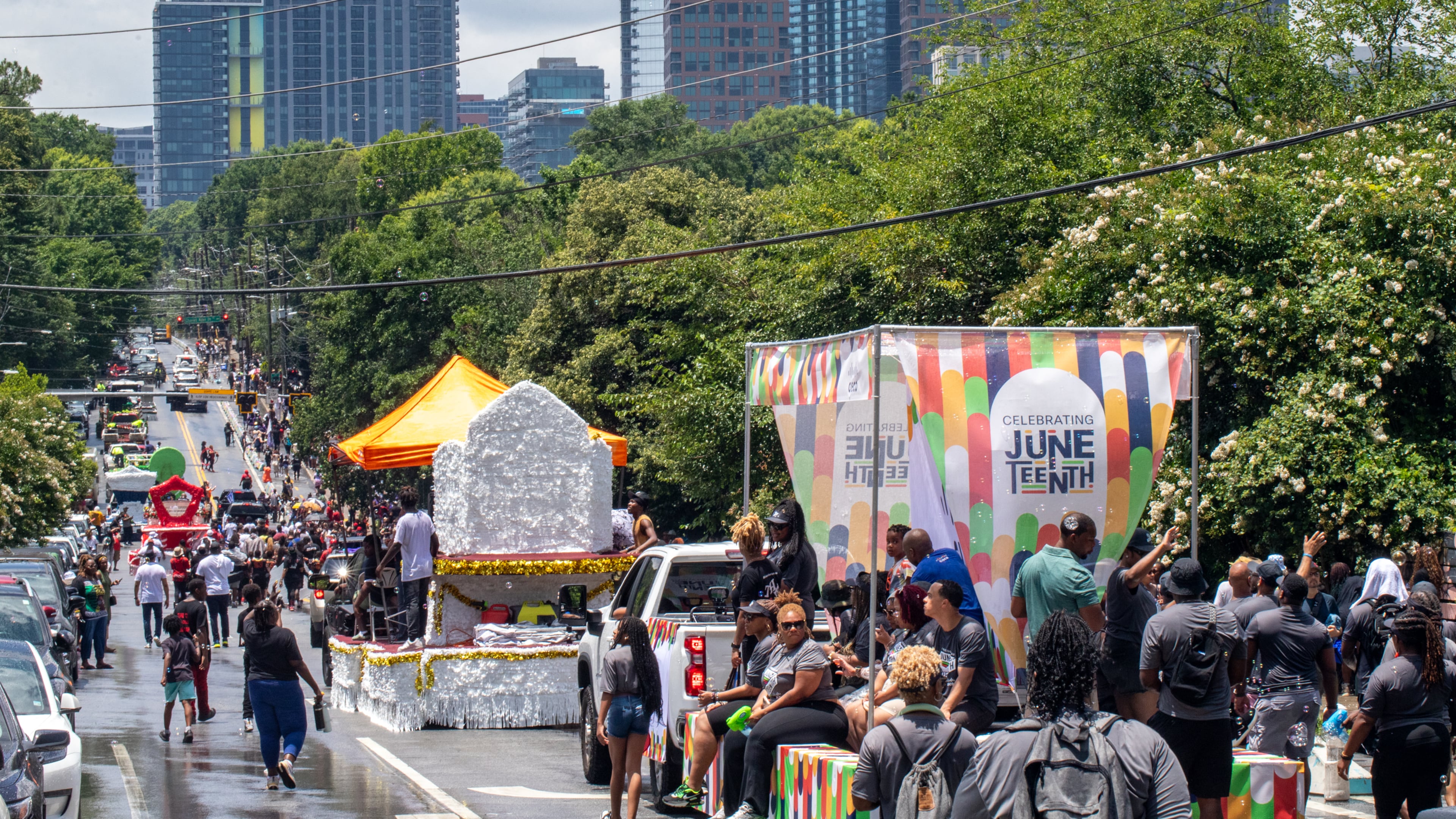 The Juneteenth Atlanta Parade and Music Festival takes place Saturday beginning at The King Center and ending at Piedmont Park. Due to sponsorship difficulties, the event was shortened from three days to two this year. (Jenni Girtman for the AJC)
