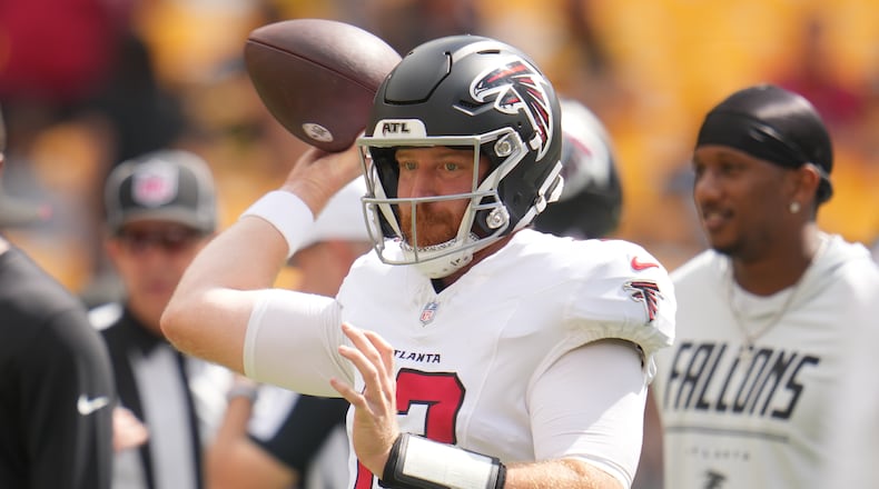 Atlanta Falcons quarterback Cooper Rush warms up before an NFL football game against the Pittsburgh Steelers, Sunday, Sept. 13, 2026, in Pittsburgh. (Gene J. Puskar/AP)