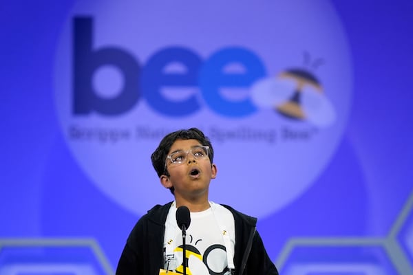 Sarv Dharavane was eliminated from Thursday's competition when he misspelled “eserine.” Spelling is fun for the Dunwoody Elementary student, who loves to read. (Julia Demaree Nikhinson/AP)