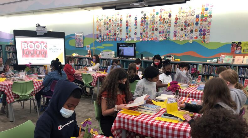 The library at River Eves Elementary frequently morphs into a Book Tasting cafe where students can explore a range of reading flavors.