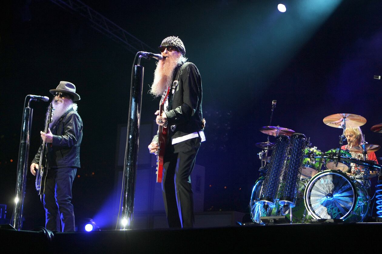 FILE - Billy Gibbons, from left, Dusty Hill and Frank Beard of ZZ Top, perform in Monaco on July 5, 2010. (AP Photo/Lionel Cironneau, File)