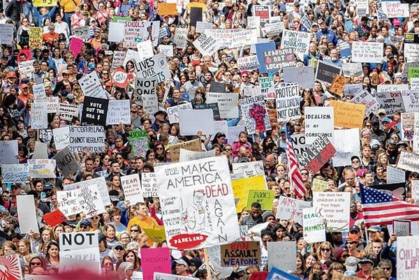 Part of a crowd estimated at 30,000 people fill the streets of Atlanta on Saturday during the March for Our Lives rally to protest gun violence, such as the Feb. 14 massacre at a high school in Parkland, Fla. (Steve Schaefer/Special to the AJC)