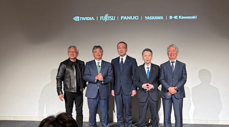 From left, Nvidia CEO Jensen Huang, Fujitsu CEO Takahito Tokita, Fanuc CEO Kenji Yamaguchi, Yaskawa CEO Masahiro Ogawa and Kawasaki Heavy CEO Yasuhiko Hashimoto pose for the media at an event to announce a new initiative in Tokyo, Thursday, July 16, 2026. (AP Photo/Yuri Kageyama)