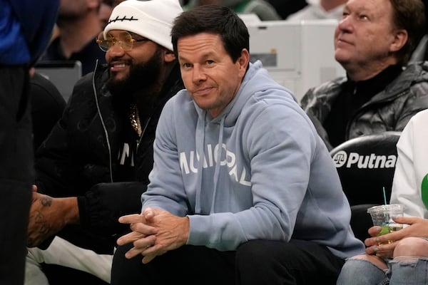 Actor Mark Wahlberg, watching a Boston Celtics-Indiana Pacers game in Boston, stars in the Georgia-made movie "By Any Means." (Courtesy of Charles Krupa/AP)