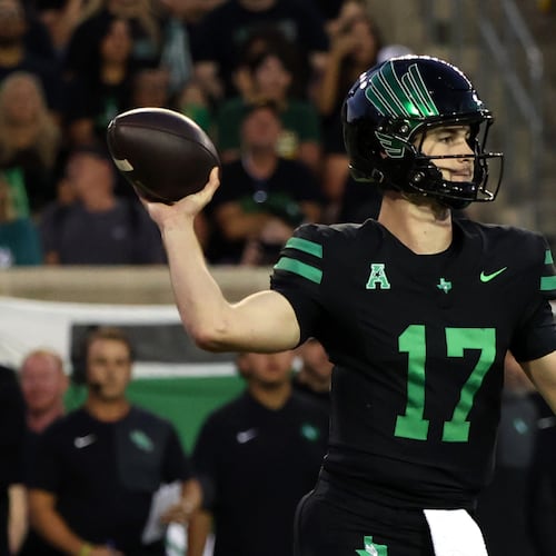 North Texas quarterback Drew Mestemaker (17) looks to throw a pass against South Florida during an NCAA college football game Friday, Oct. 10, 2025, in Denton, Texas. (AP Photo/Richard W. Rodriguez)