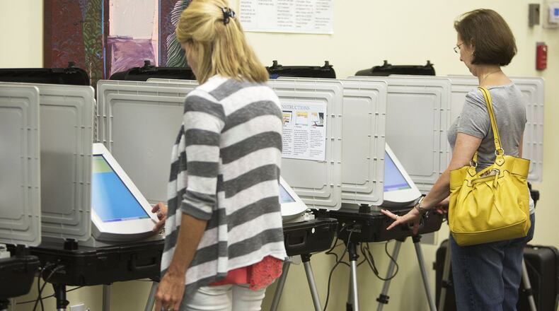Voters turn out at the Roswell Branch Public Library to cast the ballots early in the 6th congressional district special election on Monday June 5th 2017. (Photo by Phil Skinner)