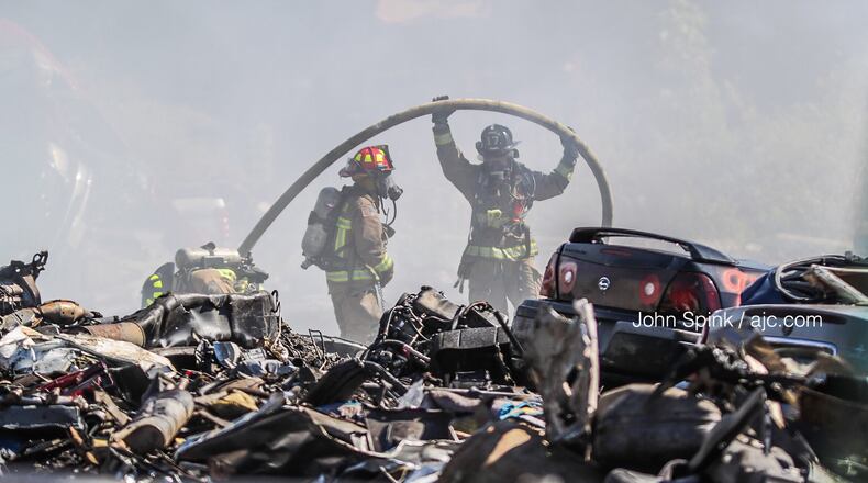 Multiple units worked to extinguish a fire at a northwest Atlanta junkyard.
