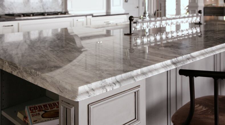 Oversized islands are one of the features of an upscale kitchen. CONTRIBUTED BY: Construction Resources.