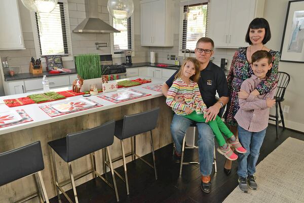 Toby and Megan Martin live in their Avondale Estates prairie-style home with their children, 9-year-old Royal and 6-year-old Mary Helen, and cats Chocolate and Ethan. Toby Martin works in sales for SecureWorks, and Megan Martin is a lawyer and partner at Jarrard & Davis, LLP.