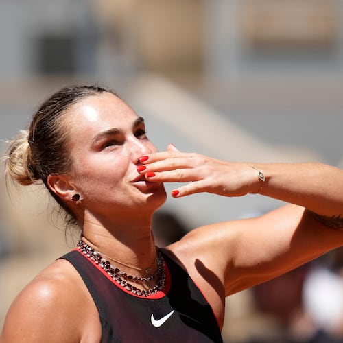 Aryna Sabalenka of Belarus celebrates after winning against Jessica Bouzas Maneiro of Spain during their first round women's singles tennis match at the French Open tennis tournament in Paris, Tuesday, May 26, 2026. (AP Photo/Christophe Ena)