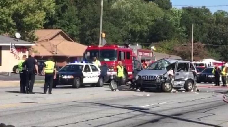 Two children were in critical condition after their van collided with a Cobb Community Transit bus Tuesday afternoon in Smyrna. (Credit: Channel 2 Action News)