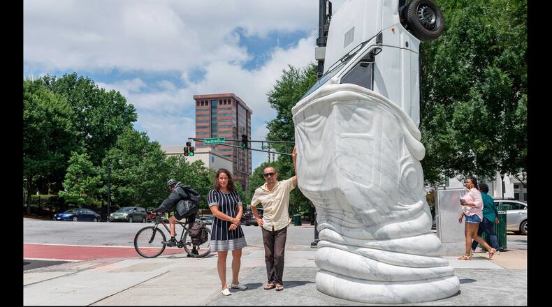German artists Julia Venske and Gregor Spänle with their creation, “Autoeater.”