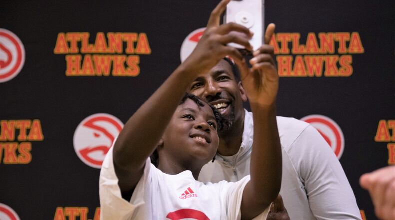 Atlanta Mayor Andre Dickens poses for a selfie