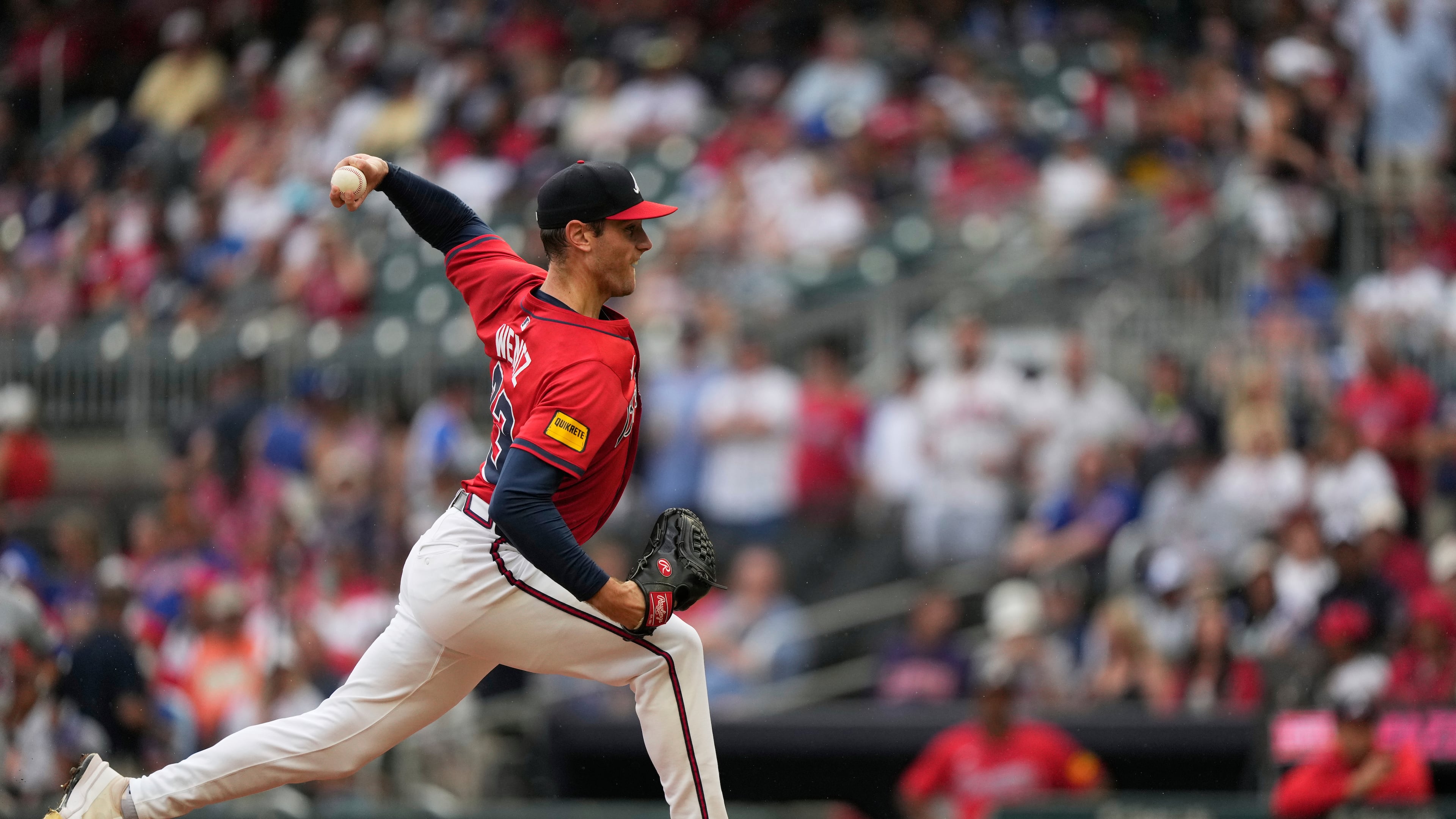 Atlanta Braves pitcher Joey Wentz (33) delivers in the first inning of a baseball game against the New York Mets, Friday, Aug. 22, 2025, in Atlanta. (AP Photo/Brynn Anderson)