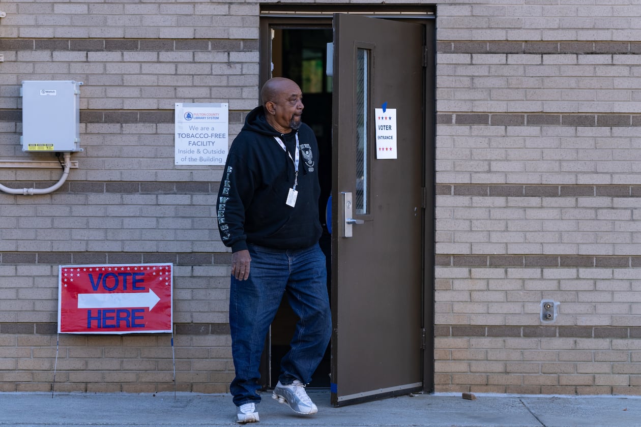 A man leaves the voting precinct at the Joan P. Garner Library at Ponce De Leon Avenue NE in Atlanta on Monday, November 4, 2025. (Ben Hendren for the AJC)