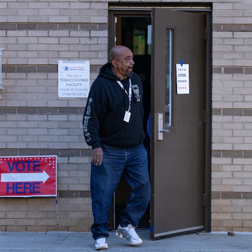 A man leaves the voting precinct at the Joan P. Garner Library at Ponce De Leon Avenue NE in Atlanta on Monday, November 4, 2025. (Ben Hendren for the AJC)