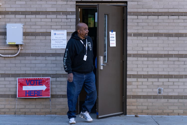 A man leaves the voting precinct at the Joan P. Garner Library at Ponce De Leon Avenue NE in Atlanta on Monday, November 4, 2025. (Ben Hendren for the AJC)
