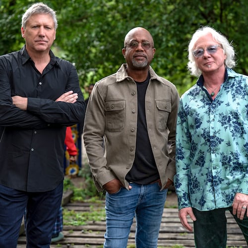 R.E.M.'s Mike Mills (right) says of Howl Owl Howl, the new band with friends (from left) Steve Gorman of the Black Crowes and Darius Rucker of Hootie and the Blowfish, "I believe the crowd expects us to be good, even though they may not know exactly what they’re gonna get before they hear it." (Courtesy of Steven Cohen Photo)