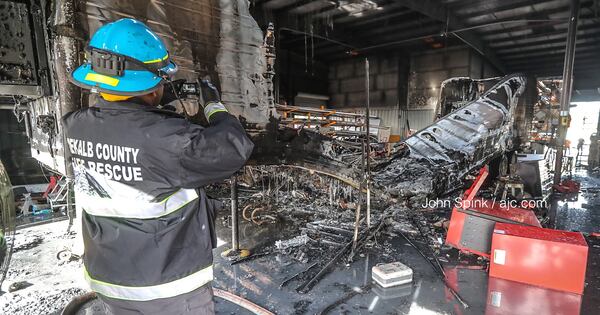 The blaze is under investigation. JOHN SPINK / JSPINK@AJC.COM