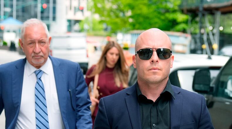 Gannon Ken Van Dyke, right, walks with his attorneys near a federal court building in New York on Tuesday, April 28, 2026. (AP Photo/Seth Wenig)